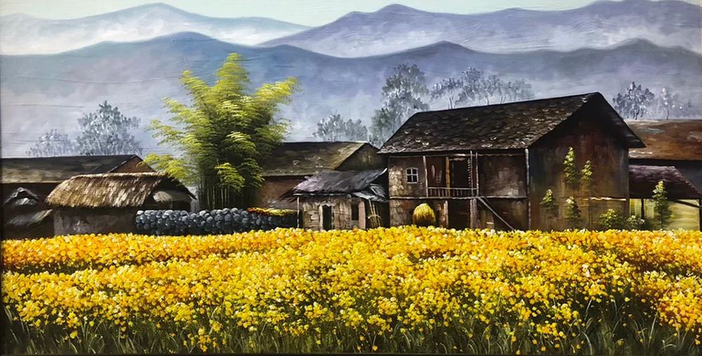 Tranh sơn dầu ngôi nhà tranh ven đồng lúa chín vàng với núi non trùng điệp phía xa